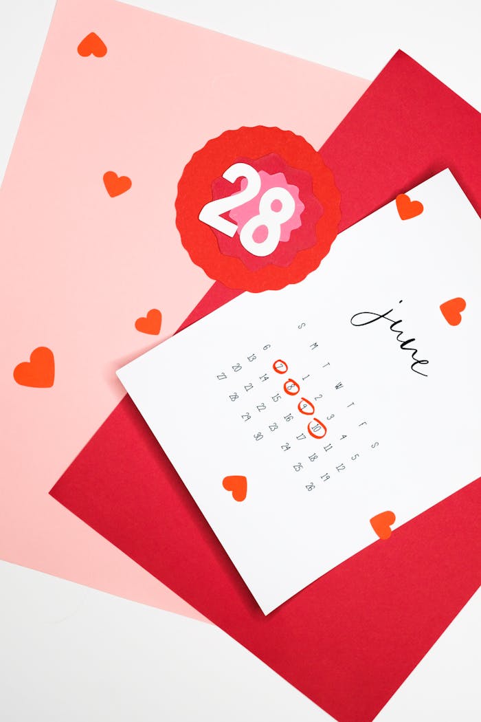 about-us-02 A vibrant calendar with heart shapes highlighting a date, ideal for event planning concepts.